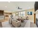 Expansive open-concept living room with stairs to the second floor and a kitchen area view at 7604 Brownstone Ct, Greenfield, IN 46140