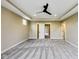 Large bedroom with a ceiling fan, walk-in closet, and ample natural light from a side window at 7604 Brownstone Ct, Greenfield, IN 46140