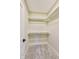 An organized walk-in closet featuring carpeted floor and shelving for storage and organization at 7604 Brownstone Ct, Greenfield, IN 46140