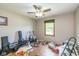 Bedroom with hardwood floors, a ceiling fan, and a window that provides natural light at 767 Harvest Ridge Dr, Avon, IN 46123