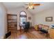 Bedroom with a vaulted ceiling, large arched window, and a ceiling fan for added comfort at 767 Harvest Ridge Dr, Avon, IN 46123