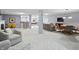 Spacious basement with a bar, pool table, TV, seating area, and light gray carpeting at 7702 N County Road 300 W, Lizton, IN 46149
