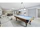 Finished basement with a pool table, recessed lighting, tile floors, and an open layout at 7702 N County Road 300 W, Lizton, IN 46149