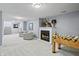 Finished basement with a fireplace, mounted deer head, seating, and foosball table at 7702 N County Road 300 W, Lizton, IN 46149