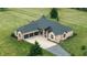 Aerial view of brick home with three-car garage and well-manicured lawn at 7702 N County Road 300 W, Lizton, IN 46149