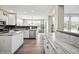 Open kitchen with stainless steel appliances and spacious countertops at 7702 N County Road 300 W, Lizton, IN 46149