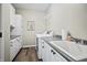 Functional laundry room with ample storage and utility sink at 7702 N County Road 300 W, Lizton, IN 46149