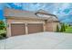 Home's exterior shows a three-car garage and wide driveway at 7845 Centerstone Ct, Indianapolis, IN 46259