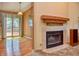View of a fireplace from the dining room, which has access to the backyard deck at 7846 Park North Cir, Indianapolis, IN 46260