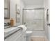 Charming bathroom with granite counters, a shower, and tasteful decor at 7914 Trotwood Cir, Indianapolis, IN 46256