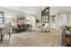 Spacious living area featuring a cozy fireplace, built-in shelving, and stylish furnishings at 7914 Trotwood Cir, Indianapolis, IN 46256