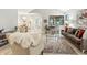 Inviting living room with hardwood floors, modern decor, and ample natural light at 7914 Trotwood Cir, Indianapolis, IN 46256