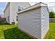 A backyard shed with plenty of green grass surrounding it for all of your lawn tool and storage needs at 9593 W Constellation Dr, Pendleton, IN 46064