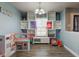 Inviting living room with hardwood flooring, open shelving, and plenty of natural light at 9593 W Constellation Dr, Pendleton, IN 46064