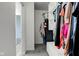 Walk-in closet with custom shelving and ample storage space for an organized wardrobe at 9593 W Constellation Dr, Pendleton, IN 46064