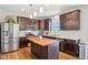 Stylish kitchen featuring stainless steel appliances, a gas range, and butcher block island at 9916 Gallop Ln, Fishers, IN 46040