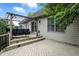 Relax on this back deck with a pergola, and views of the backyard at 1013 Chapman Blvd, Greenfield, IN 46140