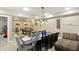 Basement featuring a long dining table, billiards room, and comfortable seating area at 1013 Chapman Blvd, Greenfield, IN 46140