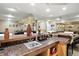 Finished basement bar featuring decor, microwave, and seating area in the background at 1013 Chapman Blvd, Greenfield, IN 46140
