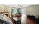 Spacious living room with hardwood floors, fireplace, and ample natural light at 1013 Chapman Blvd, Greenfield, IN 46140