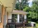 Charming back patio with a small deck, perfect for outdoor relaxation and entertaining guests at 106 N 300 W, Greenfield, IN 46140