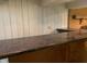 Finished basement wet bar with custom laminate countertop and wooden base at 106 N 300 W, Greenfield, IN 46140