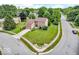 Corner lot house featuring mature trees, large lawn, and well-maintained landscaping at 11123 Garrick St, Fishers, IN 46038