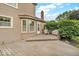 Cozy backyard deck features wood flooring, seating, and charming views of the surrounding greenery at 11123 Garrick St, Fishers, IN 46038