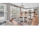 Bright kitchen and breakfast nook with white cabinets, stainless appliances, and natural light at 11123 Garrick St, Fishers, IN 46038