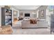 This home has a cozy living room, built-in bookshelves, and a comfortable seating area at 11123 Garrick St, Fishers, IN 46038