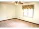 Bedroom with carpet flooring, a ceiling fan, and a window with curtains, creating a relaxing space at 126 Old Farm Rd, Danville, IN 46122