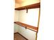 Walk-in closet featuring wood trim, carpet flooring and shelving at 126 Old Farm Rd, Danville, IN 46122