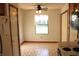 Cozy dining area with tile flooring, a ceiling fan, and a window offering a view of the outdoors at 126 Old Farm Rd, Danville, IN 46122