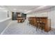 Finished basement with carpet, pool table, bar, and open space for entertaining at 13214 Dunwoody Ln, Carmel, IN 46033