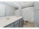 Bathroom featuring double sinks, a tub and shower combination, and neutral tile flooring at 13214 Dunwoody Ln, Carmel, IN 46033