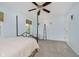 Bright bedroom with carpet flooring, a window, and a chair in front of the window at 13214 Dunwoody Ln, Carmel, IN 46033