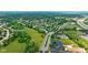 Neighborhood aerial view featuring mature trees, adjacent highway, landscaping and proximity to 13470 Shakamac at 13470 Shakamac Dr, Carmel, IN 46032