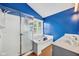 Bright bathroom featuring a glass-enclosed shower, soaking tub and double sink vanity at 13470 Shakamac Dr, Carmel, IN 46032