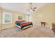 Bright bedroom with vaulted ceiling, windows, and carpet at 13470 Shakamac Dr, Carmel, IN 46032