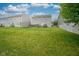 Expansive backyard with lush green grass, providing ample space for outdoor activities at 13884 Wendessa Dr, Fishers, IN 46038