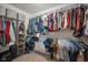 Walk-in closet with organized hanging racks, shelves, and storage for clothing at 13884 Wendessa Dr, Fishers, IN 46038