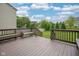 An outdoor deck provides a view to a manicured lawn and neighborhood at 13884 Wendessa Dr, Fishers, IN 46038