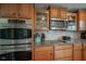 Well-equipped kitchen featuring stainless steel appliances, granite countertops and wood cabinets at 13884 Wendessa Dr, Fishers, IN 46038