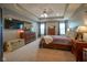 Spacious main bedroom with tray ceiling, dresser, carpet flooring and natural light at 13884 Wendessa Dr, Fishers, IN 46038