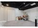 Unfinished basement with storage, closets, and painted ceiling at 1393 Stoney Creek Cir, Carmel, IN 46032