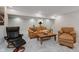Basement sitting area with carpet, recessed lighting, couch, and chair at 1393 Stoney Creek Cir, Carmel, IN 46032