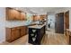 Well-appointed kitchen with granite counters, stainless steel appliances and wood cabinets at 1393 Stoney Creek Cir, Carmel, IN 46032