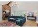 Open living room featuring a brick fireplace, large windows, and modern furnishings at 1393 Stoney Creek Cir, Carmel, IN 46032