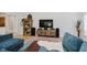 Comfortable living room with stylish furnishings, a large TV, and modern decor at 1393 Stoney Creek Cir, Carmel, IN 46032