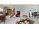Bright living room showcasing staircase, decor, and an open layout at 1393 Stoney Creek Cir, Carmel, IN 46032
